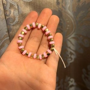 Clay bead bracelet( Pink with gold charms ) IMA bracelet